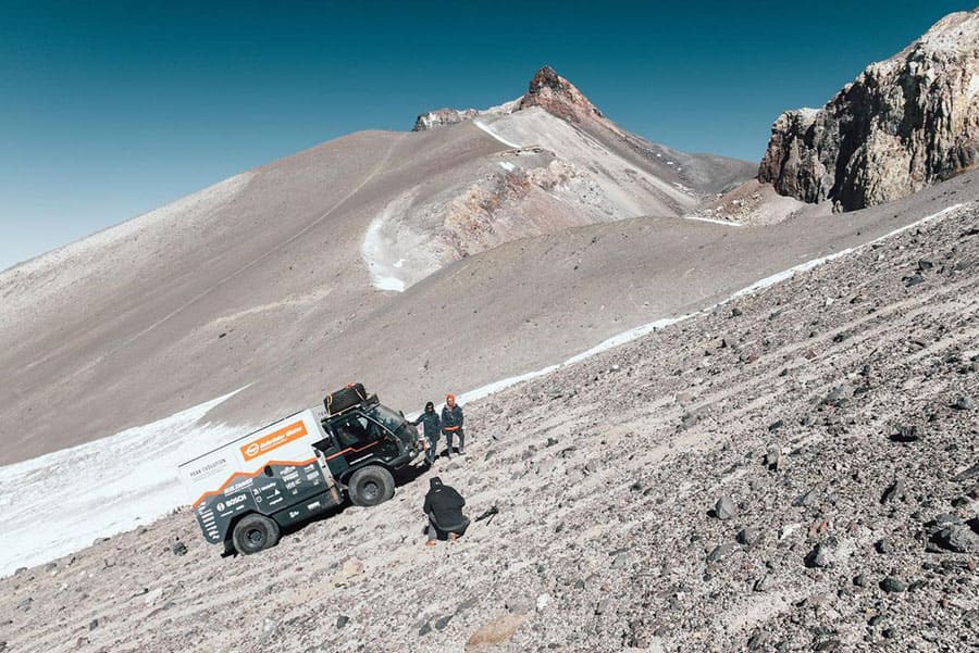 Peak Evolution, truck at the top of the mountain